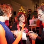 Michelle Wuttke and Renee Allie sell raffle tickets, PhotoGALA at NOMA, Dec 10, 2009 (c) Samuel Portera