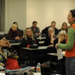 Lori Waselchuk welcomes photographers at the Friday evening review orientation, 2009 (c) David Rae Morris