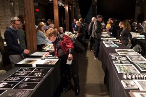 Portfolio Review participants share their work with the public at the Ogden Museum of Southern Art, PhotoNOLA 2018 ©Jeremy Wade